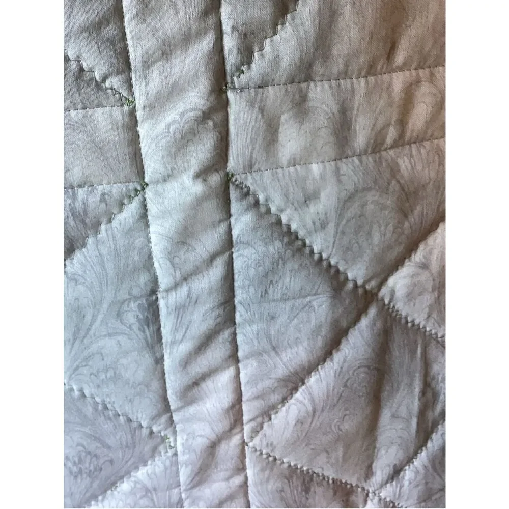New without tags. Medley of Green Fabrics with White Borders Quilt